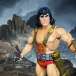 Super7 Ultimates! Kull the Conqueror 7-inch action figure in heroic stance holding golden sword, comic-inspired barbarian king collectible.
