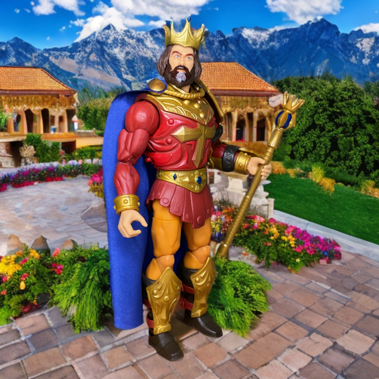 Seitenansicht der New Eternia King Randor Figur, die die detaillierte Skulptur des abnehmbaren Brust- und Schulterpanzers hervorhebt, gepaart mit einem weichen roten Warenumhang.