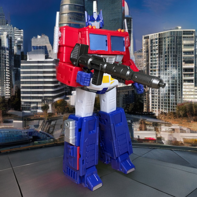 Studio Series 86-31 Optimus Prime transforming mid-sequence, with red and blue panels shifting to form the truck cab, set against a neutral background.