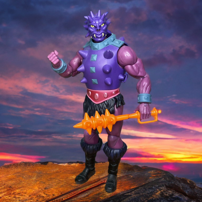 Spikor from the MOTU Classics line, a 7-inch figure with detailed purple spikes and a trident arm, posed in a dynamic stance with a glowing Skeletor’s lair background.