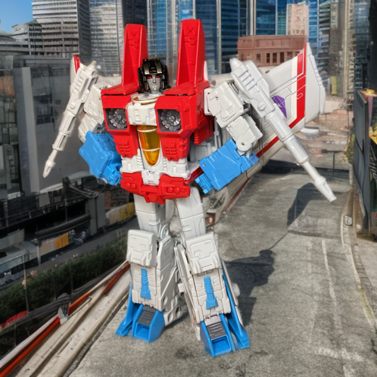 Starscream in Generation 1 robot mode, displaying his signature wings, red torso, and null-ray arm weapons as the treacherous Decepticon Air Commander.