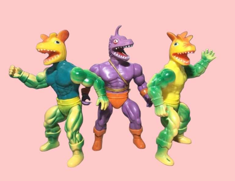 Showing the three action figures related to the Gecko character on a neutral background.