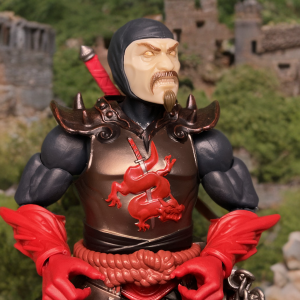 Close up of Ninjor’s alternate mask with ancient ruins in the background.