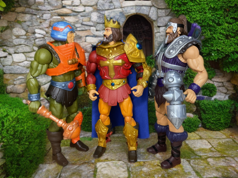 Masterverse König Randor Figur mit gekröntem Kopf, roter und blauer Rüstung, vor einem dynamischen Hintergrund zum Ausstellen.