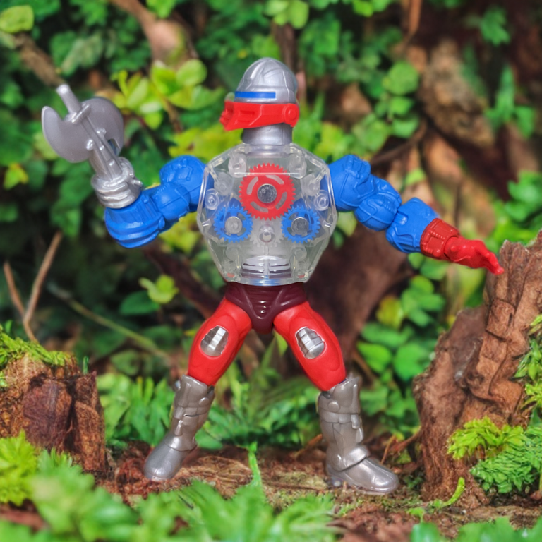 MOTU Origins Roboto adaptação fiel à figura de ação vintage de 1985.