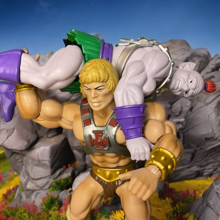 Triumphant full-body pose of He-Man against a clear blue sky and distant mountain peaks embodying heroic resolve of battle.