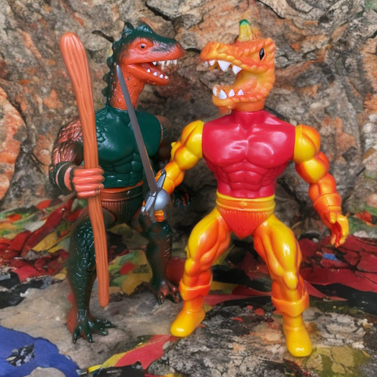 Warrior Beasts Stegos and Ramar posed on a rocky outcrop.