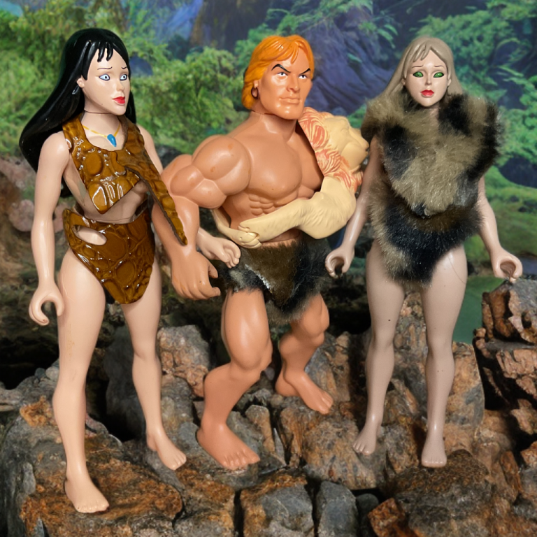 Trio of Cat Girl, Jungle Lord, and Huntress standing defiantly on rocky outcrop amid misty jungle landscape.