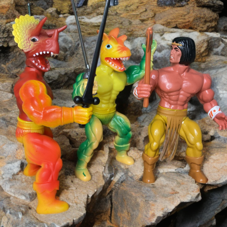 Tense triangular standoff on a rugged prehistoric battlefield: Arak in yellow loincloth facing the horned Gauna and crested Zardus.