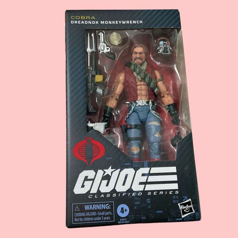 Windowed box packaging for Dreadnok Monkeywrench #167, showcasing vibrant artwork and 10 accessories like axes and gas mask.