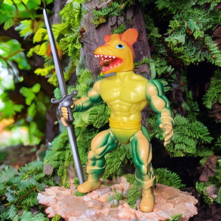 Wide shot of Zardus, the yellow fish-like warrior with a sword, standing fiercely amid mossy trees and green foliage, with a subtle glow enhancing the forest’s vibrancy.