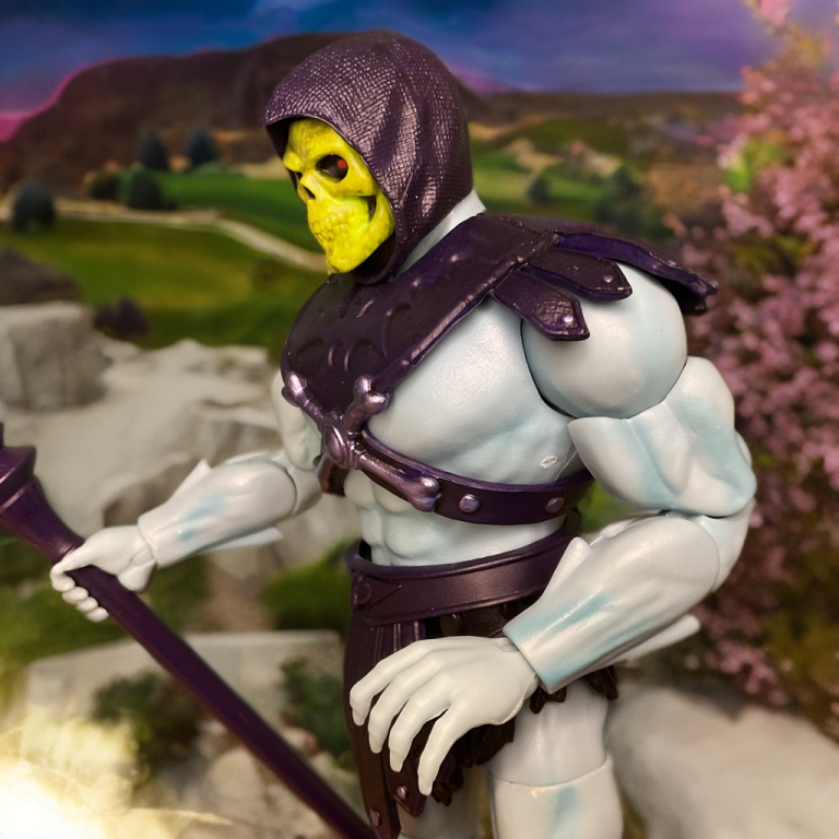 Side view of Skeletor with his Havoc Staff, detailed with metallic purple paint.