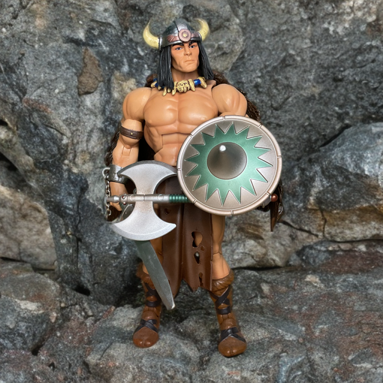 Vikor in Viking helmet and fur, wielding axe and shield, standing firmly on rocky terrain against a gray stone wall.