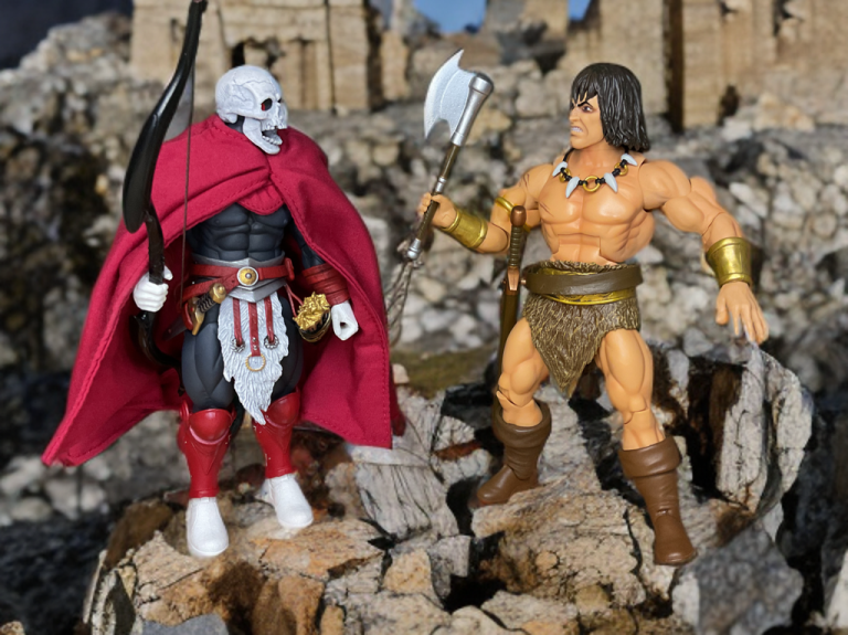 Conan with battle axe faces caped skeletal warrior on jagged, pillar-strewn terrain.