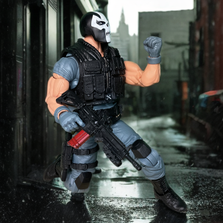 Crossbones Marvel Legends figure in a black skull mask and tactical vest, holding a submachine gun.