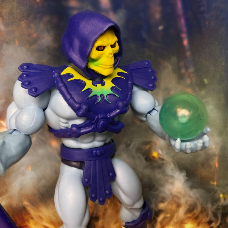 Close-up of Skeletor in a smoky, fiery chamber, gripping a radiant green orb that pulses with otherworldly energy, his skull face twisted in intense concentration.