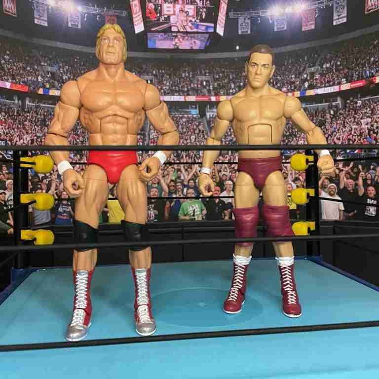 Alte Promo-Pose von Regal und Paul Orndorff in passenden Strumpfhosen, mit erhobenen Armen nach einem seltenen Tag-Sieg von 1994.