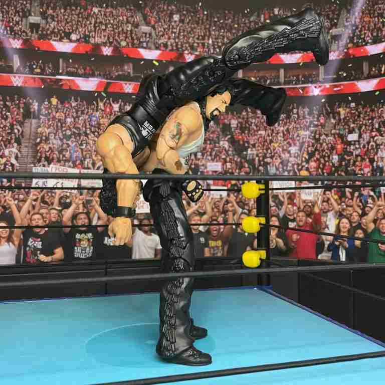 Nash’s Diesel action figure overpowering Jacobs’ Imposter in the ring.