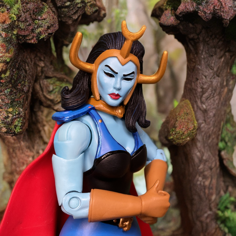 Shokoti standing in front of a woodland backdrop.