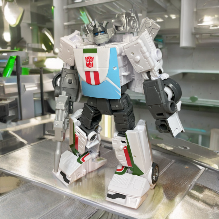 Wheeljack in action pose, demonstrating ball-jointed shoulders and knee bends for dynamic battle stances.