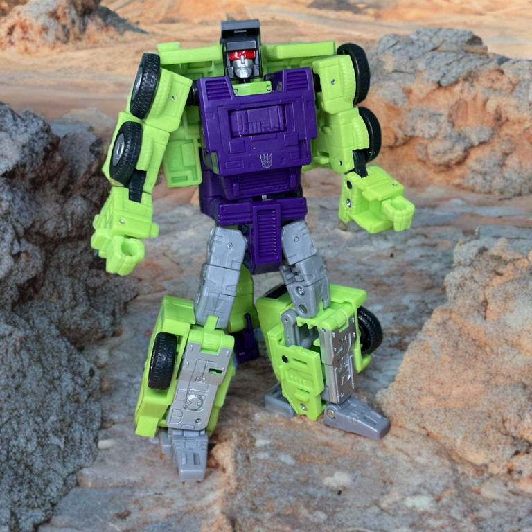 Hook in robot mode standing in an arid desert location.