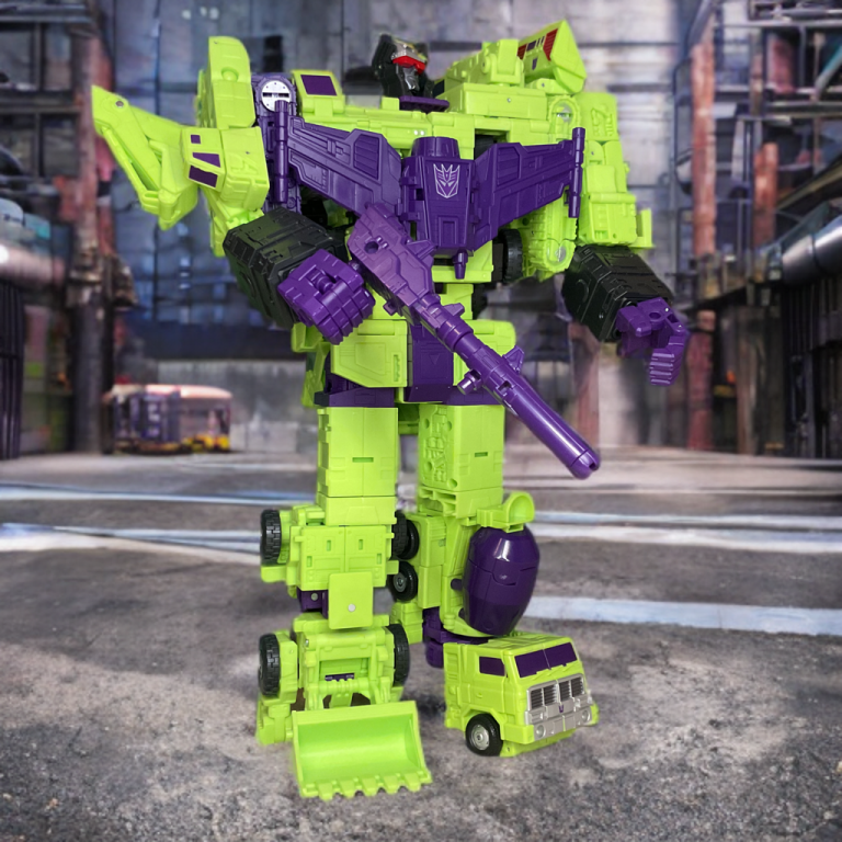 The mighty Devastator posed with hand canon in an industrial setting.