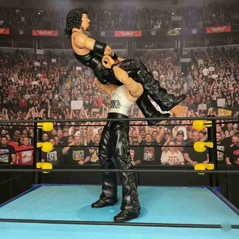 Action figure of Nash’s Diesel delivering a Jackknife to Imposter.