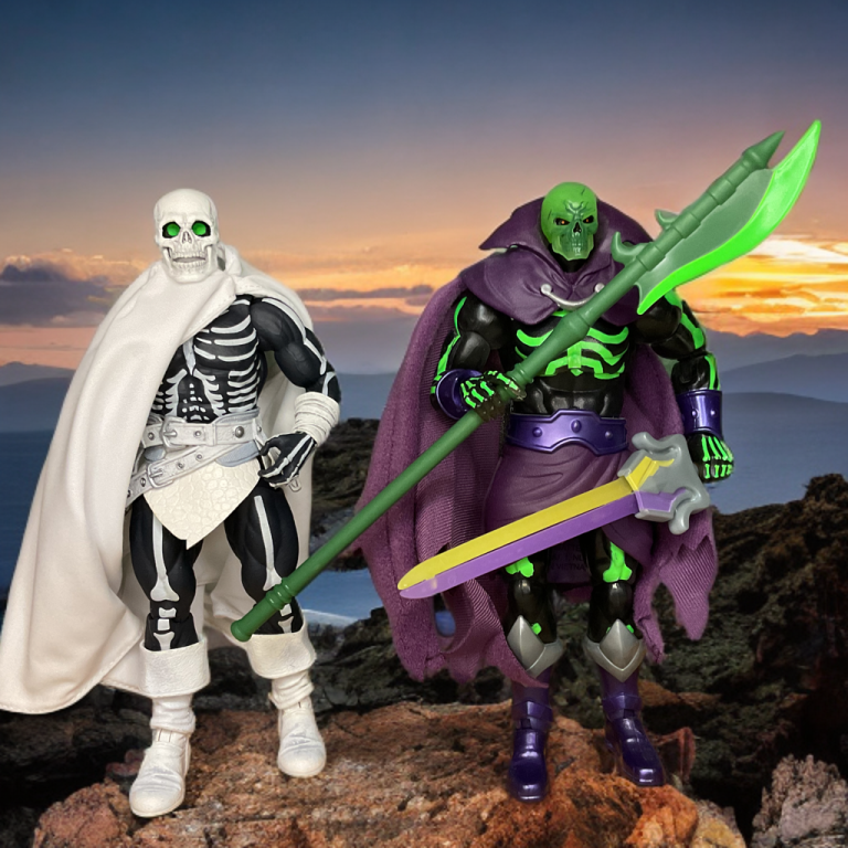 Two action figures side by side: a white-robed Head Hunter with a glowing green-eyed skull and Masterverse Scareglow with a purple-robed figure with a green skull and halberd, both with black bodies and white skeletal details, posed on a rocky landscape at sunset.