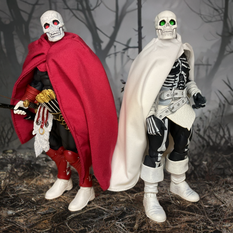 Two skeletal figures Skull Man and Head Hunter with capes, one in red and one in white, both with black bodies and white bones, posed in a dark forest setting, the red-caped figure holding a sword and the white-caped figure with a belt and skeletal hands.