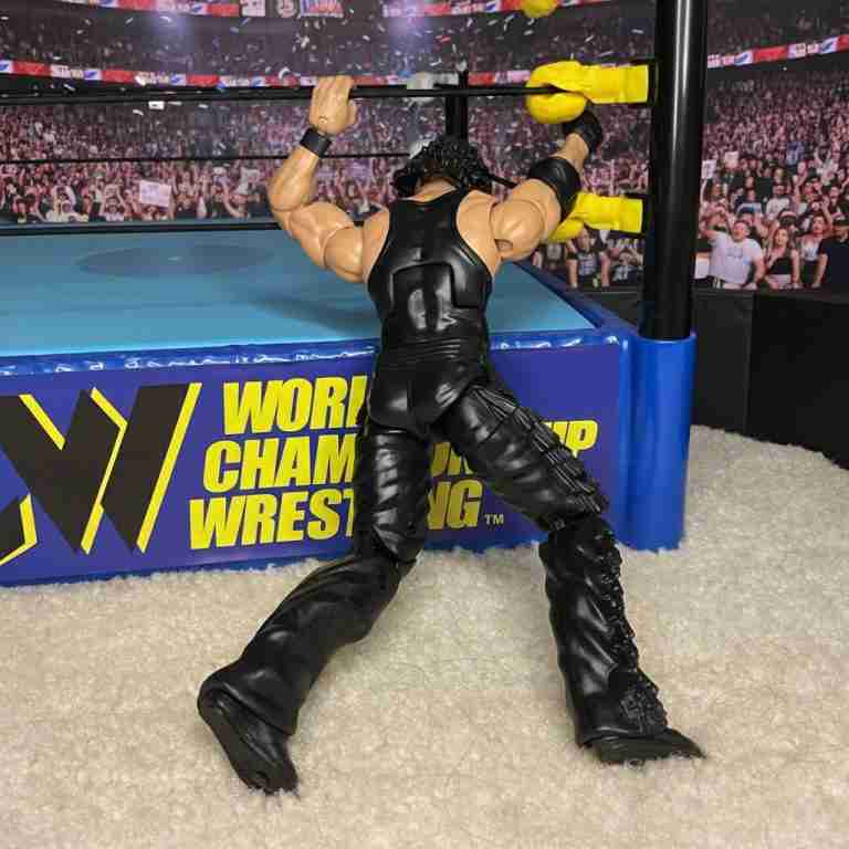 Action figure of Kevin Nash’s Diesel facing Glenn Jacobs’ Imposter in a ring.