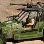 Crankcase figure seated in A.W.E. Striker cockpit gripping steering wheel