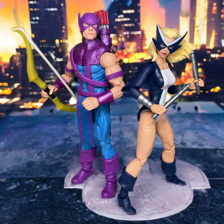 Hawkeye and Mockingbird together in front of a cityscape background.