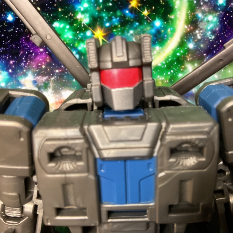 Close-up of Vortex Age of the Primes orange translucent chest cockpit and glowing visor detail