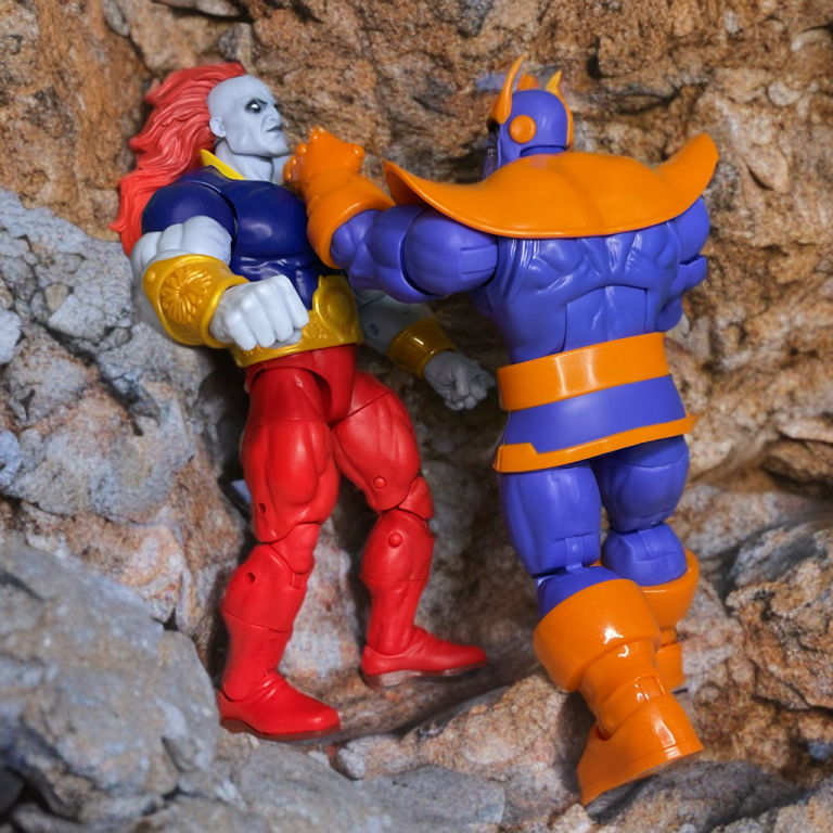 Thanos lands a powerful left hook on Champion of the Universe.