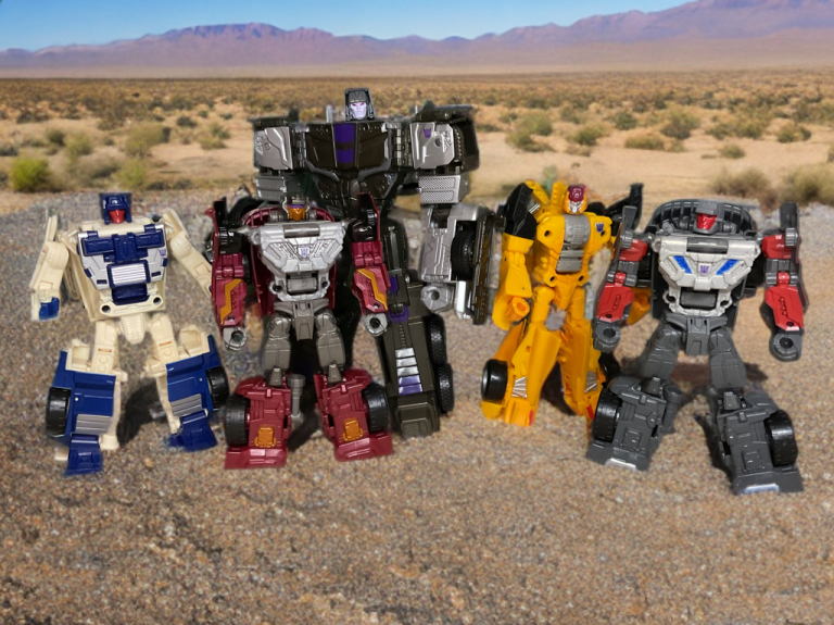 The Stunticons posed in a desert highway scene.